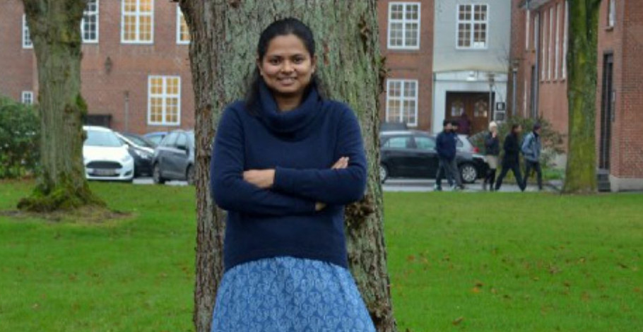 Priya standing outside smiling